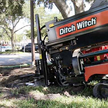 An image of a Ditch Witch drilling into the ground.